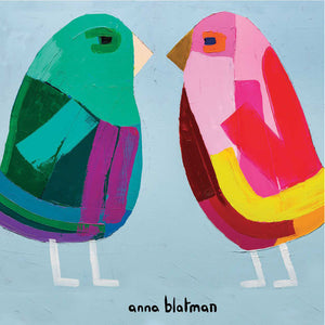 Two very brightly coloured birds facing each other painted by Anna Blatman and presented on this coaster