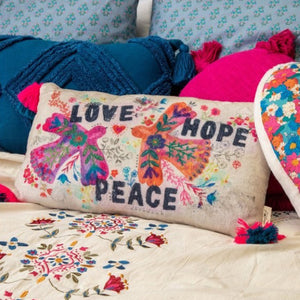 Rectangular shaped cushion with two doves and the words Love, Hope and Peace on the front