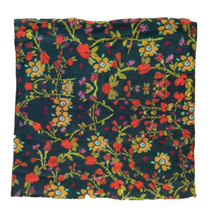 This Boho Bandana has a dark green background with yellow and orange flowers