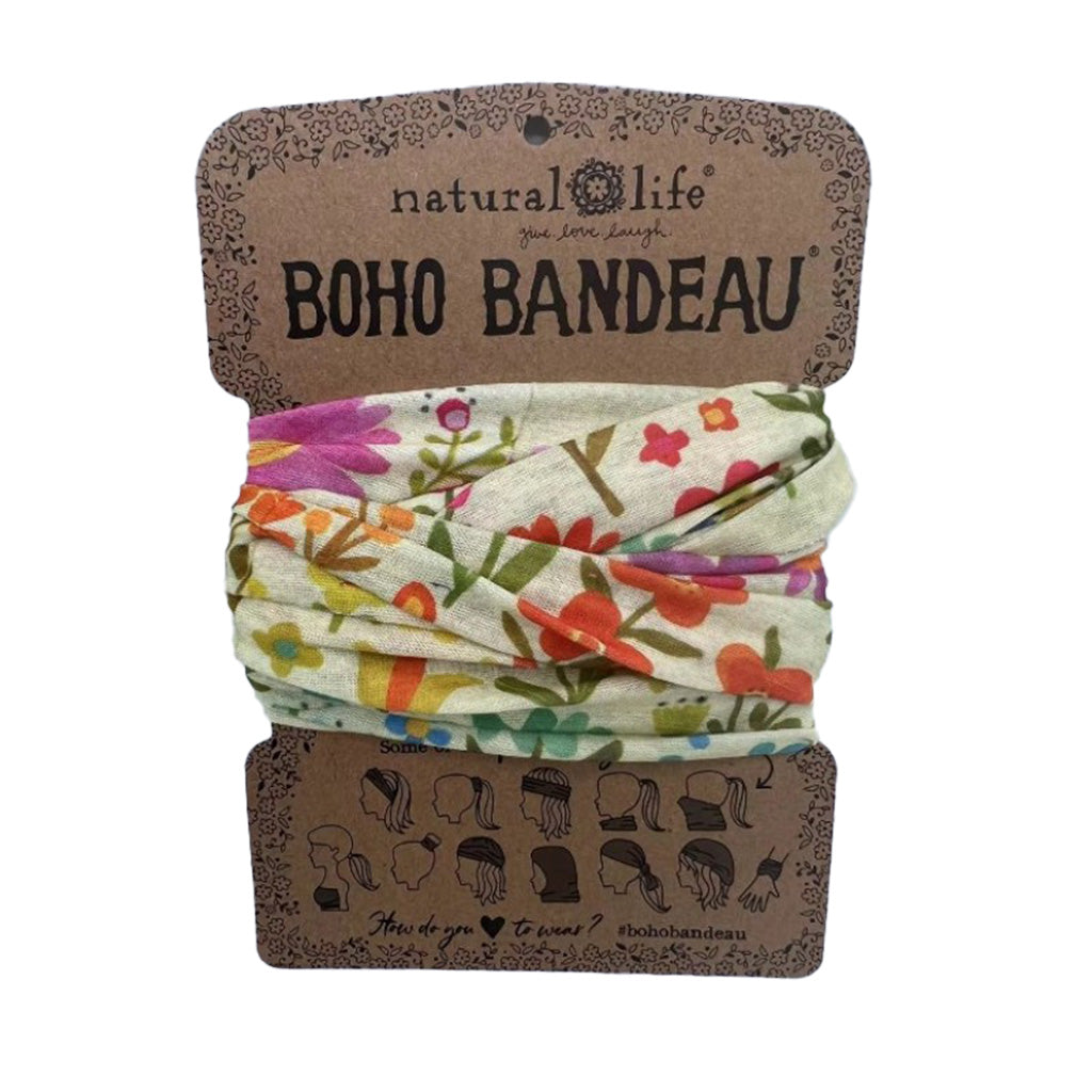 This  Boho Bandana has a cream base with pink, orange and yellow flowers