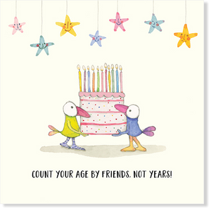 Twigseed card with two comical birds carrying a large cake with lots of candles and the words "Count your age by friends, not years!"