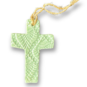 Small ceramic cross in sage green with jute string for hanging