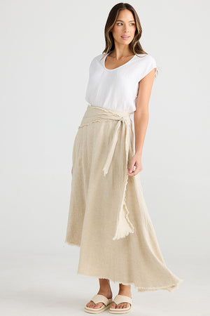 Asymmetrical long skirt with raw edging in natural jacquard from Australian label Shanty Corp