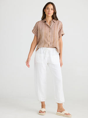 Relaxed fit white pants with drawstring leg cuff from Shanty