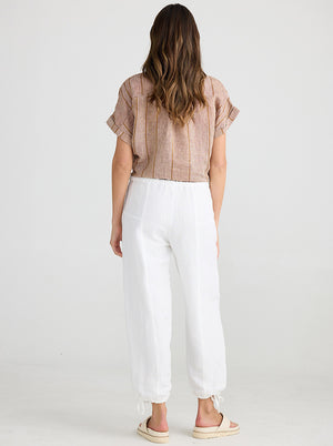 Rear view of Relaxed fit white pants with drawstring leg cuff from Shanty