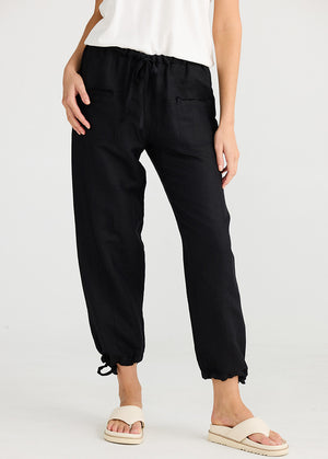 Relaxed fit black pants with drawstring leg cuff from Shanty