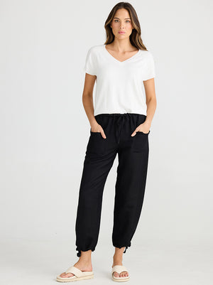 Relaxed fit black pants with drawstring leg cuff from Shanty