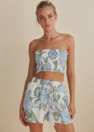 Gorgeous shorts with large blue flower and green leaf print by Talisman