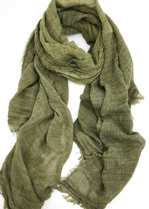 Close up photo of Yana scarf in olive by Holiday