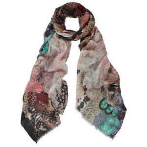 Made from fine merino wool, this scarf is stunning in soft mellow colours of browns and pinks