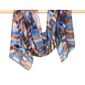 This Jumble silk scarf is popular for those who are Autumn toned because the combination of browns and electric blues are amazing