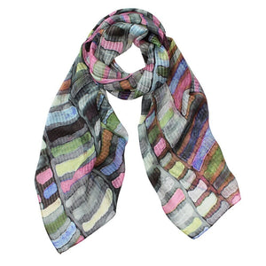 Light weight, super soft and beautiful against the skin makes this Jumble silk scarf from DLUX a winner