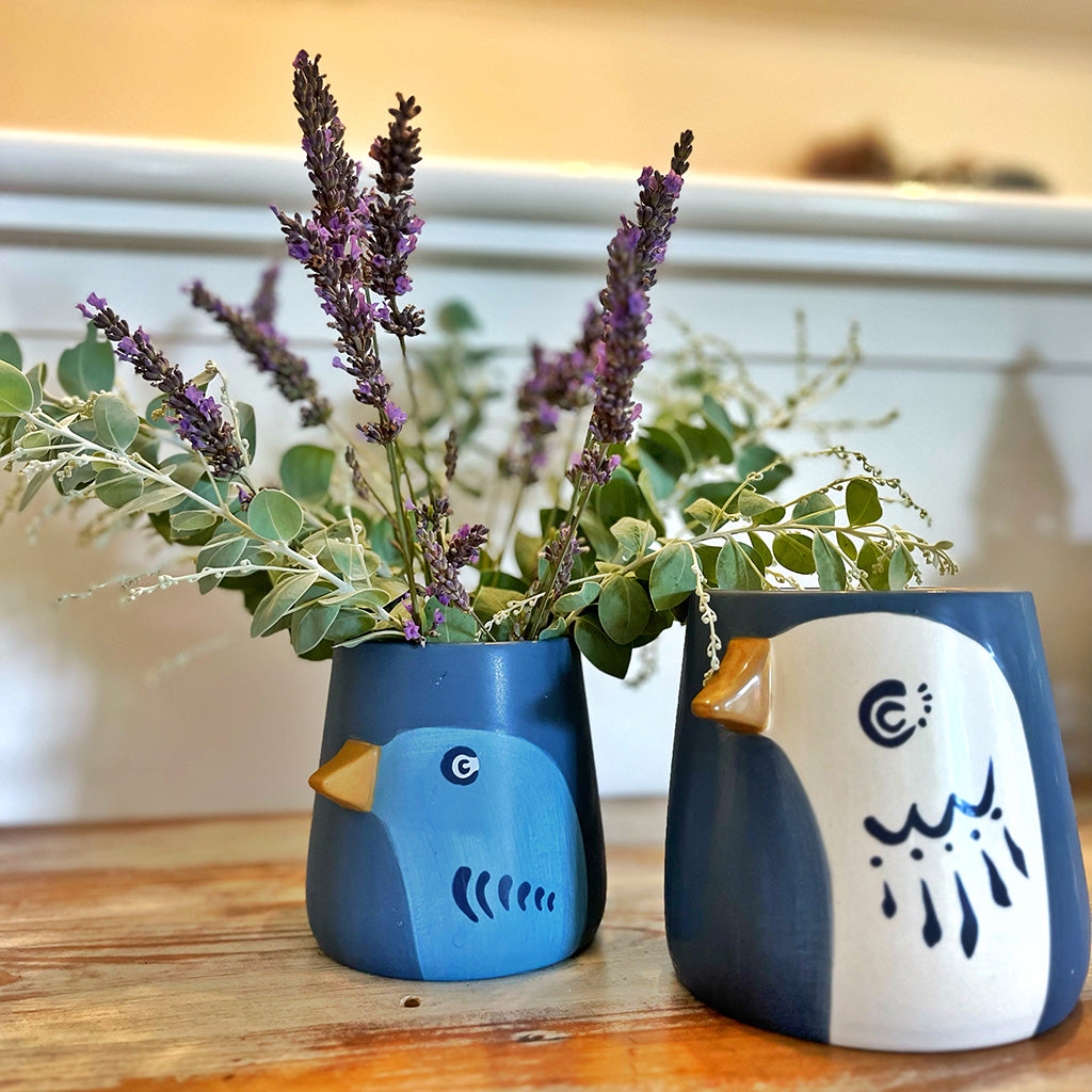 Image depicting both small and large 3D pots with bird design