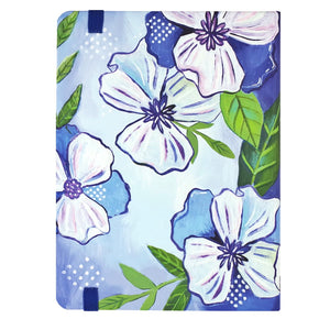 Beautiful hibiscus blooms in shades of blue and violet tumble across front and back covers, and the Scripture verse on the front is featured prominently and embossed with glossy highlights