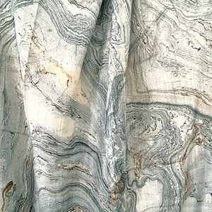 A close up image of the marbling effect on this scarf