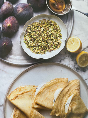 Ricotta crepes with figs, honey and pistachio recipe in Ottolenghi's book 'Sweet'