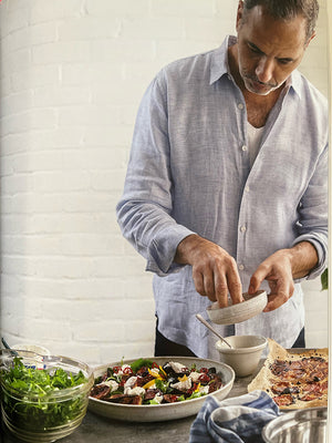 Co-author of this book Flavour, Ottolenghi presenting beautiful dishes for the table