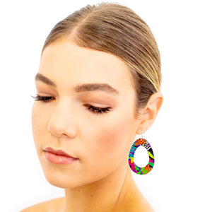 Lovely young woman wearing Art Hoop earrings in Secret Garden design