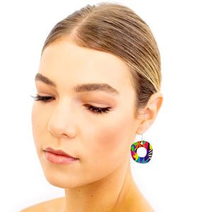 Model wearing Vibrant and colourful Cats Eye earrings designed by Australian artist Jennie Riley