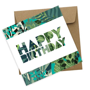 Tropical Happy Birthday design by Australian artist Jennie Riley depicting tropical leaves in shades of green and Happy Birthday message