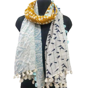 Cotton scarf with white, blue and mint coloured pom poms around the edge