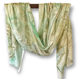 Lovely scarf made from modal with a marble print in shades of green, teal, and beige