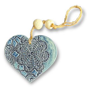 Hand made ceramic hanging heart in denim colour with unique 3D pattern by Australian sculptor Wendy Britton