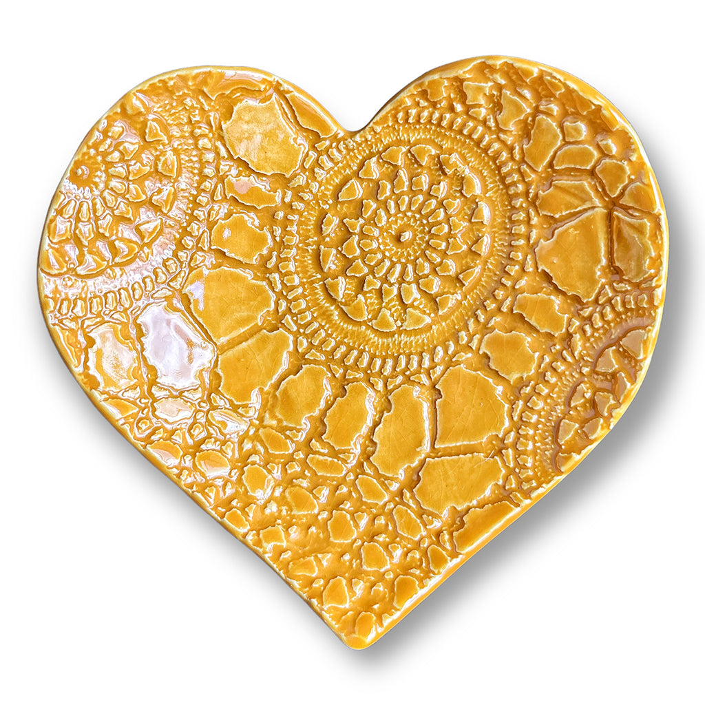 Heart shaped dish in sunflower yellow with unique pattern hand made by Wendy Britton Ceramics