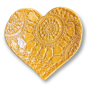 Heart shaped dish in sunflower yellow with unique pattern hand made by Wendy Britton Ceramics