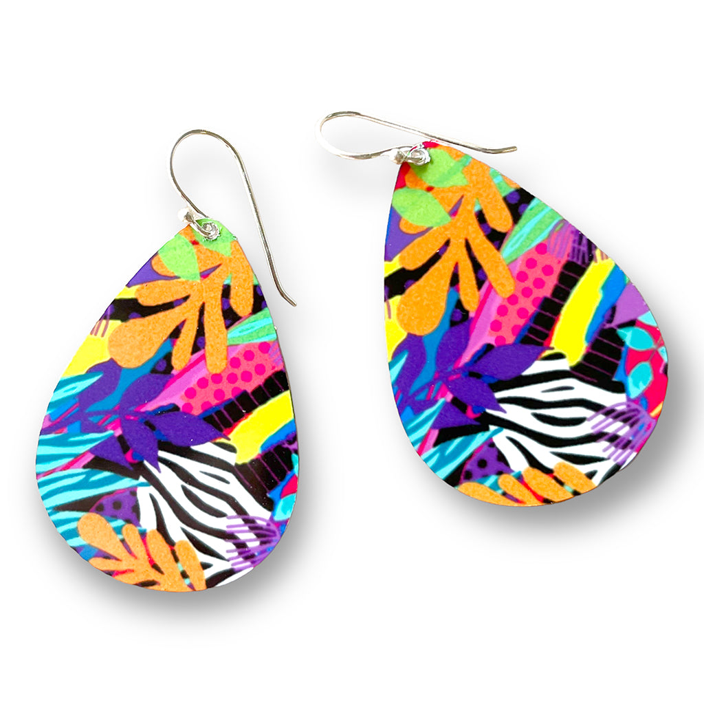 Titled &#39;secret garden&#39; these tear drop shaped earrings are filled with bold colours and a touch of black and white
