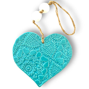 Hand made ceramic hanging heart in turquoise colour with unique 3D pattern by Australian sculptor Wendy Britton