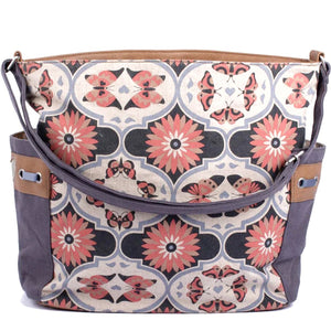 This Everyday Tote from bsirius is a large canvas bag with a butterfly mandala design