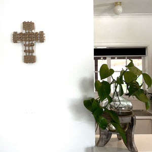 With it's white ceramic base and natural twine overlay, the Como wall cross would look great in the natural design home