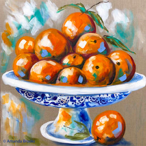 Lilli Rock Seasonal Fruit Set of 4 Coasters adorned with beautiful artwork by Australian artist Amanda Brooks with bowl filled with oranges